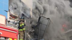 Watch: Thick smoke billows from South Korea car parts plant in deadly fire