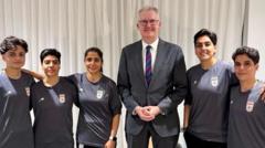 Five Iranian footballers granted Australian visas after anthem protest